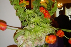 orange gerberas-viburnum-orange tulips-greenery garland-wimbush house-Flowers By Holland.welcome